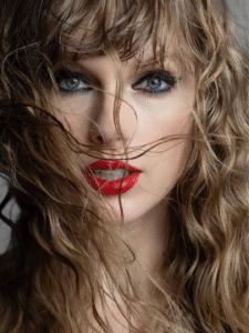 Taylor Swift en el escenario o en un evento, representando la superación del desamor y el impulso para mejorar la autoestima en mujeres jóvenes.